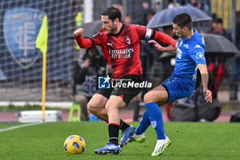 2024-01-07 - Ac Milan's defender Davide Calabria against Empoli FC's forward Nicolo Cambiaghi - EMPOLI FC VS AC MILAN - ITALIAN SERIE A - SOCCER