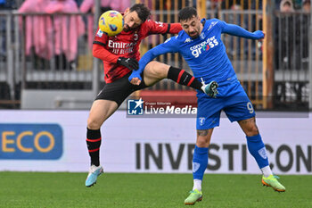 2024-01-07 - AC Milan's defender Alessandro Florenzi against Empoli FC's forward Francesco Caputo - EMPOLI FC VS AC MILAN - ITALIAN SERIE A - SOCCER