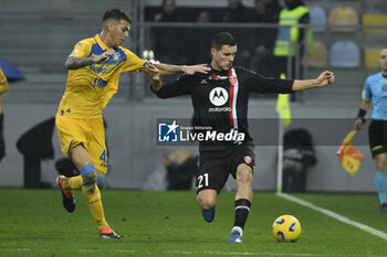 2024-01-06 - Enzo Barrenechea of Frosinone Calcio and Valentin Carboni of A.C. Monza during the 19th day of the Serie A Championship between Frosinone Calcio vs A.C. Monza, 6 January 2024 at the Benito Stirpe Stadium, Frosinone, Italy. - FROSINONE CALCIO VS AC MONZA - ITALIAN SERIE A - SOCCER