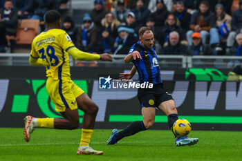 2024-01-06 - Carlos Augusto of FC Internazionale seen in action during Serie A 2023/24 football match between FC Internazionale and Hellas Verona at Giuseppe Meazza Stadium, Milan, Italy on January 06, 2024 - INTER - FC INTERNAZIONALE VS HELLAS VERONA FC - ITALIAN SERIE A - SOCCER