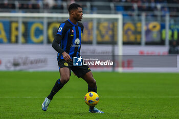 2024-01-06 - Denzel Dumfries of FC Internazionale seen in action during Serie A 2023/24 football match between FC Internazionale and Hellas Verona at Giuseppe Meazza Stadium, Milan, Italy on January 06, 2024 - INTER - FC INTERNAZIONALE VS HELLAS VERONA FC - ITALIAN SERIE A - SOCCER
