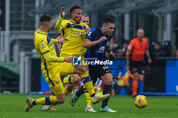 2024-01-06 - Lautaro Martinez of FC Internazionale competes for the ball with Diego Coppola of Hellas Verona FC and Michael Folorunsho of Hellas Verona FC during Serie A 2023/24 football match between FC Internazionale and Hellas Verona at Giuseppe Meazza Stadium, Milan, Italy on January 06, 2024 - INTER - FC INTERNAZIONALE VS HELLAS VERONA FC - ITALIAN SERIE A - SOCCER
