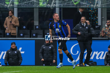 2024-01-06 - Davide Frattesi of FC Internazionale celebrates after scoring a goal during Serie A 2023/24 football match between FC Internazionale and Hellas Verona at Giuseppe Meazza Stadium, Milan, Italy on January 06, 2024 - INTER - FC INTERNAZIONALE VS HELLAS VERONA FC - ITALIAN SERIE A - SOCCER