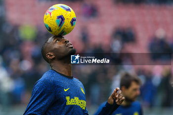 2024-01-06 - Marcus Thuram of FC Internazionale warms up during Serie A 2023/24 football match between FC Internazionale and Hellas Verona at Giuseppe Meazza Stadium, Milan, Italy on January 06, 2024 - INTER - FC INTERNAZIONALE VS HELLAS VERONA FC - ITALIAN SERIE A - SOCCER