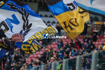 2024-01-06 - A fan waves a giant flag seen during Serie A 2023/24 football match between FC Internazionale and Hellas Verona at Giuseppe Meazza Stadium, Milan, Italy on January 06, 2024 - INTER - FC INTERNAZIONALE VS HELLAS VERONA FC - ITALIAN SERIE A - SOCCER