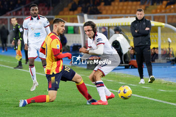 2024-01-06 - Remi Oudin of US Lecce and Tommaso Augello of Cagliari Calcio - US LECCE VS CAGLIARI CALCIO - ITALIAN SERIE A - SOCCER