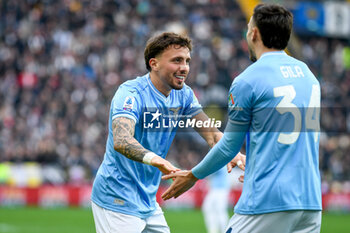 2024-01-07 - Lazio's Luca Pellegrini celebrates after scoring a goal with Lazio's Mario Gila Fuentes - UDINESE CALCIO VS SS LAZIO - ITALIAN SERIE A - SOCCER