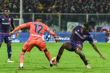2024-01-14 - Udinese's Hassane Kamara fights for the ball against Fiorentina's Micheal Kayode - ACF FIORENTINA VS UDINESE CALCIO - ITALIAN SERIE A - SOCCER