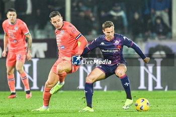 2024-01-14 - Fiorentina's Arthur fights for the ball against Udinese's Flroain Thauvin - ACF FIORENTINA VS UDINESE CALCIO - ITALIAN SERIE A - SOCCER