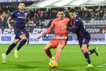 2024-01-14 - Udinese's Flroain Thauvin fights for the ball against Fiorentina's Lucas Martinez Quarta - ACF FIORENTINA VS UDINESE CALCIO - ITALIAN SERIE A - SOCCER