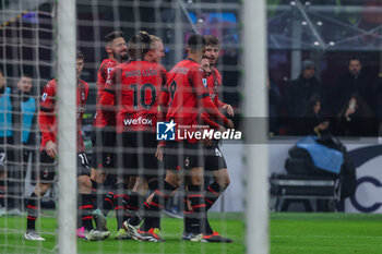 2024-01-14 - Olivier Giroud of AC Milan celebrates with his teammates after scoring a goal during Serie A 2023/24 football match between AC Milan and AS Roma at San Siro Stadium, Milan, Italy on January 14, 2024 - AC MILAN VS AS ROMA - ITALIAN SERIE A - SOCCER