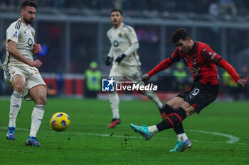 2024-01-14 - Theo Hernandez of AC Milan scores a goal during Serie A 2023/24 football match between AC Milan and AS Roma at San Siro Stadium, Milan, Italy on January 14, 2024 - AC MILAN VS AS ROMA - ITALIAN SERIE A - SOCCER