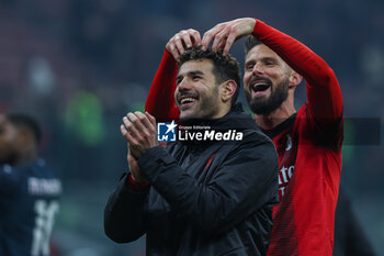 2024-01-14 - Theo Hernandez of AC Milan and Olivier Giroud of AC Milan celebrate the victory at the end of the match during Serie A 2023/24 football match between AC Milan and AS Roma at San Siro Stadium, Milan, Italy on January 14, 2024 - AC MILAN VS AS ROMA - ITALIAN SERIE A - SOCCER