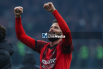 2024-01-14 - Olivier Giroud of AC Milan celebrates the victory at the end of the match during Serie A 2023/24 football match between AC Milan and AS Roma at San Siro Stadium, Milan, Italy on January 14, 2024 - AC MILAN VS AS ROMA - ITALIAN SERIE A - SOCCER