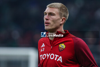 2024-01-14 - Rasmus Kristensen of AS Roma warms up during Serie A 2023/24 football match between AC Milan and AS Roma at San Siro Stadium, Milan, Italy on January 14, 2024 - AC MILAN VS AS ROMA - ITALIAN SERIE A - SOCCER