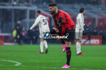 2024-01-14 - Olivier Giroud of AC Milan injured during Serie A 2023/24 football match between AC Milan and AS Roma at San Siro Stadium, Milan, Italy on January 14, 2024 - AC MILAN VS AS ROMA - ITALIAN SERIE A - SOCCER