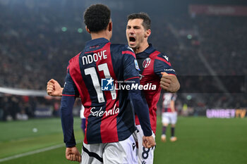 2024-02-14 - Bologna FC's midfielder Remo Freuler celebrates with Bologna FC's forward Dan Ndoye - BOLOGNA FC VS ACF FIORENTINA - ITALIAN SERIE A - SOCCER