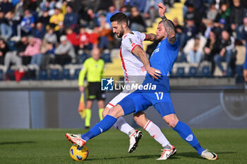 2024-01-21 - Empoli FC's forward Alberto Cerri against AC Monza's midfielder Roberto Gagliardini - EMPOLI FC VS AC MONZA - ITALIAN SERIE A - SOCCER