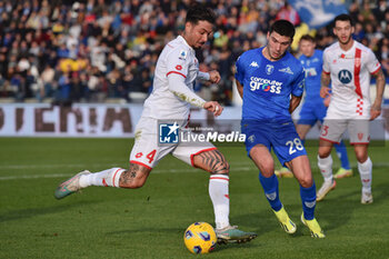 2024-01-21 - AC Monza's defender Armando Izzo against Empoli FC's forward Nicolo Cambiaghi - EMPOLI FC VS AC MONZA - ITALIAN SERIE A - SOCCER