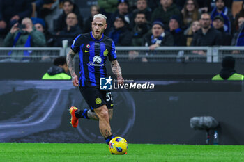 2024-02-28 - Federico Dimarco of FC Internazionale seen in action during Serie A 2023/24 football match between FC Internazionale and Atalanta BC at Giuseppe Meazza Stadium, Milan, Italy on February 28, 2024 - INTER - FC INTERNAZIONALE VS ATALANTA BC - ITALIAN SERIE A - SOCCER