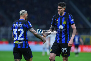 2024-02-28 - Alessandro Bastoni of FC Internazionale (R) celebrates with Federico Dimarco of FC Internazionale (L) during Serie A 2023/24 football match between FC Internazionale and Atalanta BC at Giuseppe Meazza Stadium, Milan, Italy on February 28, 2024 - INTER - FC INTERNAZIONALE VS ATALANTA BC - ITALIAN SERIE A - SOCCER