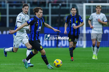 2024-02-28 - Nicolo Barella of FC Internazionale seen in action during Serie A 2023/24 football match between FC Internazionale and Atalanta BC at Giuseppe Meazza Stadium, Milan, Italy on February 28, 2024 - INTER - FC INTERNAZIONALE VS ATALANTA BC - ITALIAN SERIE A - SOCCER