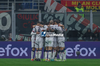 2024-01-27 - Joshua Zirkzee of Bologna FC celebrates with his teammates after scoring a goal during Serie A 2023/24 football match between AC Milan and Bologna FC at San Siro Stadium, Milan, Italy on January 27, 2024 - AC MILAN VS BOLOGNA FC - ITALIAN SERIE A - SOCCER