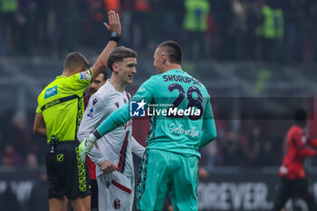2024-01-27 - Alexis Saelemaekers of Bologna FC celebrates with Lukasz Skorupski of Bologna FC during Serie A 2023/24 football match between AC Milan and Bologna FC at San Siro Stadium, Milan, Italy on January 27, 2024 - AC MILAN VS BOLOGNA FC - ITALIAN SERIE A - SOCCER