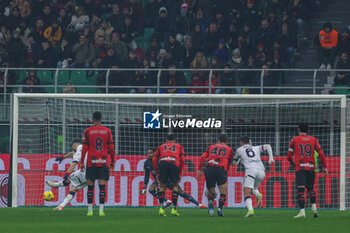 2024-01-27 - Riccardo Orsolini of Bologna FC scores a penalty during Serie A 2023/24 football match between AC Milan and Bologna FC at San Siro Stadium, Milan, Italy on January 27, 2024 - AC MILAN VS BOLOGNA FC - ITALIAN SERIE A - SOCCER