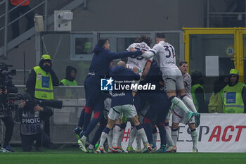 2024-01-27 - Riccardo Orsolini of Bologna FC celebrates with his teammates after scoring a goal during Serie A 2023/24 football match between AC Milan and Bologna FC at San Siro Stadium, Milan, Italy on January 27, 2024 - AC MILAN VS BOLOGNA FC - ITALIAN SERIE A - SOCCER