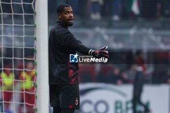 2024-01-27 - Mike Maignan of AC Milan looks on during Serie A 2023/24 football match between AC Milan and Bologna FC at San Siro Stadium, Milan, Italy on January 27, 2024 - AC MILAN VS BOLOGNA FC - ITALIAN SERIE A - SOCCER