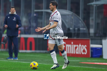 2024-01-27 - Remo Freuler of Bologna FC seen in action during Serie A 2023/24 football match between AC Milan and Bologna FC at San Siro Stadium, Milan, Italy on January 27, 2024 - AC MILAN VS BOLOGNA FC - ITALIAN SERIE A - SOCCER
