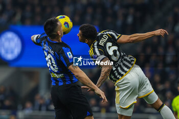 2024-02-04 - Lautaro Martinez of FC Internazionale seen in action with Luiz da Silva Danilo of Juventus FC during Serie A 2023/24 football match between FC Internazionale and Juventus FC at Giuseppe Meazza Stadium, Milan, Italy on February 04, 2024 - INTER - FC INTERNAZIONALE VS JUVENTUS FC - ITALIAN SERIE A - SOCCER