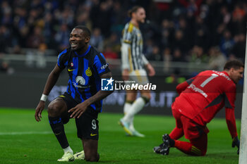 2024-02-04 - Marcus Thuram of FC Internazionale celebrates after scoring a goal during Serie A 2023/24 football match between FC Internazionale and Juventus FC at Giuseppe Meazza Stadium, Milan, Italy on February 04, 2024 - INTER - FC INTERNAZIONALE VS JUVENTUS FC - ITALIAN SERIE A - SOCCER