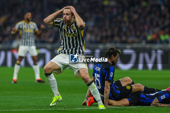 2024-02-04 - Federico Gatti of Juventus FC reacts during Serie A 2023/24 football match between FC Internazionale and Juventus FC at Giuseppe Meazza Stadium, Milan, Italy on February 04, 2024 - INTER - FC INTERNAZIONALE VS JUVENTUS FC - ITALIAN SERIE A - SOCCER