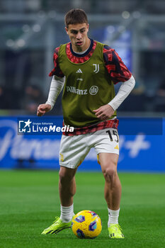 2024-02-04 - Kenan Yildiz of Juventus FC warms up during Serie A 2023/24 football match between FC Internazionale and Juventus FC at Giuseppe Meazza Stadium, Milan, Italy on February 04, 2024 - INTER - FC INTERNAZIONALE VS JUVENTUS FC - ITALIAN SERIE A - SOCCER