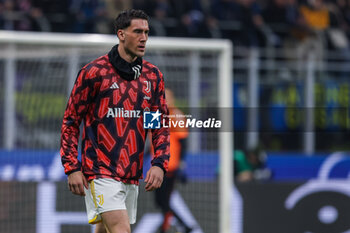 2024-02-04 - Dusan Vlahovic of Juventus FC warms up during Serie A 2023/24 football match between FC Internazionale and Juventus FC at Giuseppe Meazza Stadium, Milan, Italy on February 04, 2024 - INTER - FC INTERNAZIONALE VS JUVENTUS FC - ITALIAN SERIE A - SOCCER