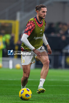 2024-02-04 - Adrien Rabiot of Juventus FC warms up during Serie A 2023/24 football match between FC Internazionale and Juventus FC at Giuseppe Meazza Stadium, Milan, Italy on February 04, 2024 - INTER - FC INTERNAZIONALE VS JUVENTUS FC - ITALIAN SERIE A - SOCCER