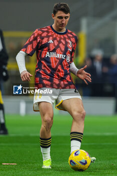 2024-02-04 - Andrea Cambiaso of Juventus FC warms up during Serie A 2023/24 football match between FC Internazionale and Juventus FC at Giuseppe Meazza Stadium, Milan, Italy on February 04, 2024 - INTER - FC INTERNAZIONALE VS JUVENTUS FC - ITALIAN SERIE A - SOCCER