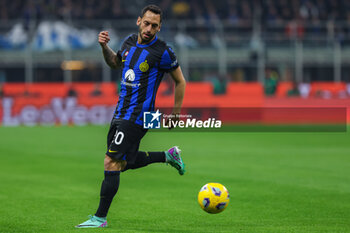 2024-02-04 - Hakan Calhanoglu of FC Internazionale seen in action during Serie A 2023/24 football match between FC Internazionale and Juventus FC at Giuseppe Meazza Stadium, Milan, Italy on February 04, 2024 - INTER - FC INTERNAZIONALE VS JUVENTUS FC - ITALIAN SERIE A - SOCCER