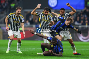 2024-02-04 - Nicolo Barella of FC Internazionale and Marcus Thuram of FC Internazionale compete for the ball with Gleison Bremer of Juventus FC, Luiz da Silva Danilo of Juventus FC and Manuel Locatelli of Juventus FC during Serie A 2023/24 football match between FC Internazionale and Juventus FC at Giuseppe Meazza Stadium, Milan, Italy on February 04, 2024 - INTER - FC INTERNAZIONALE VS JUVENTUS FC - ITALIAN SERIE A - SOCCER