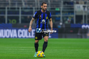 2024-02-04 - Hakan Calhanoglu of FC Internazionale seen in action during Serie A 2023/24 football match between FC Internazionale and Juventus FC at Giuseppe Meazza Stadium, Milan, Italy on February 04, 2024 - INTER - FC INTERNAZIONALE VS JUVENTUS FC - ITALIAN SERIE A - SOCCER
