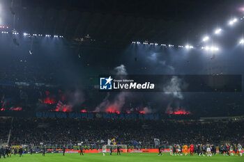 2024-02-04 - FC Internazionale supporters use pyrotechnics as they celebrate victory at full-time during Serie A 2023/24 football match between FC Internazionale and Juventus FC at Giuseppe Meazza Stadium, Milan, Italy on February 04, 2024 - INTER - FC INTERNAZIONALE VS JUVENTUS FC - ITALIAN SERIE A - SOCCER