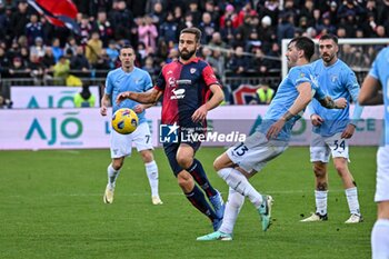 2024-02-10 - Leonardo Pavoletti of Cagliari Calcio, Alessio Romagnoli of SS Lazio - CAGLIARI CALCIO VS SS LAZIO - ITALIAN SERIE A - SOCCER