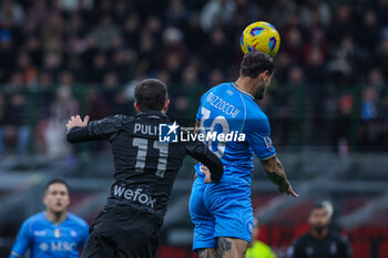 2024-02-11 - Pasquale Mazzocchi of SSC Napoli competes for the ball with Christian Pulisic of AC Milan during Serie A 2023/24 football match between AC Milan and SSC Napoli at San Siro Stadium, Milan, Italy on February 11, 2024 - AC MILAN VS SSC NAPOLI - ITALIAN SERIE A - SOCCER