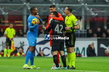 2024-02-11 - Juan Jesus of SSC Napoli protests with Alessandro Florenzi of AC Milan and Referee Daniele Doveri during Serie A 2023/24 football match between AC Milan and SSC Napoli at San Siro Stadium, Milan, Italy on February 11, 2024 - AC MILAN VS SSC NAPOLI - ITALIAN SERIE A - SOCCER
