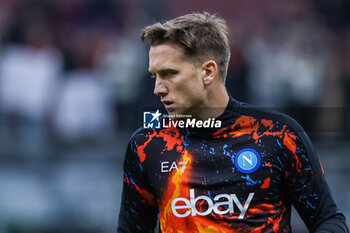 2024-02-11 - Piotr Zielinski of SSC Napoli warms up during Serie A 2023/24 football match between AC Milan and SSC Napoli at San Siro Stadium, Milan, Italy on February 11, 2024 - AC MILAN VS SSC NAPOLI - ITALIAN SERIE A - SOCCER