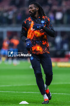 2024-02-11 - Andre Anguissa of SSC Napoli warms up during Serie A 2023/24 football match between AC Milan and SSC Napoli at San Siro Stadium, Milan, Italy on February 11, 2024 - AC MILAN VS SSC NAPOLI - ITALIAN SERIE A - SOCCER