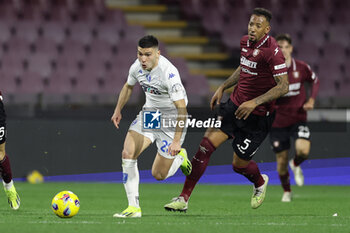 2024-02-09 - Empioli's Italian forward Nicolo Cambiaghi challenges for the ball with Salernitana's German defender Jerome Boateng during the Serie A football match between Unione Sportiva Salernitana vs Empoli at the Arechi Stadium in Salerno on February 09, 2024. - US SALERNITANA VS EMPOLI FC - ITALIAN SERIE A - SOCCER
