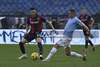 2024-02-18 - Charalampos Lykogiannis of Bologna F.C. and Adam Marusic of S.S. Lazio during the 25th day of the Serie A Championship between S.S. Lazio vs Bologna F.C. 1909, 18 February 2024 at the Olympic Stadium in Rome. - SS LAZIO VS BOLOGNA FC - ITALIAN SERIE A - SOCCER